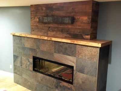 Reclaimed Paneling and Timber Hearth
